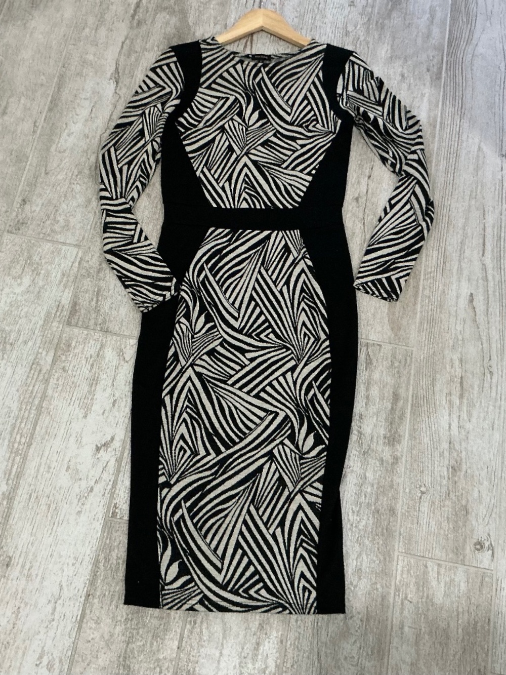 River Island fitted, bodycon dress with long sleeves .Size 4